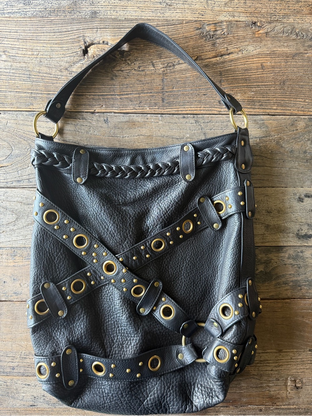 Black Leather Hobo Bag with Gold Grommet Detail